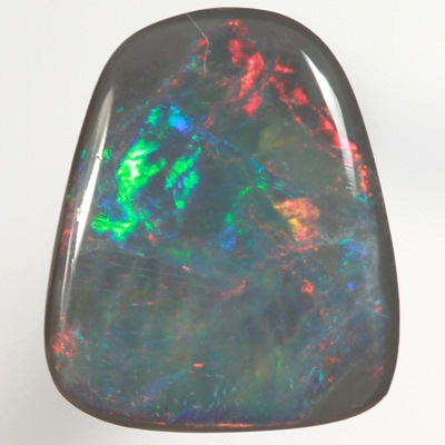 SOLID BLACK OPAL Bright rolling flashes of red to green SEE VIDEOS